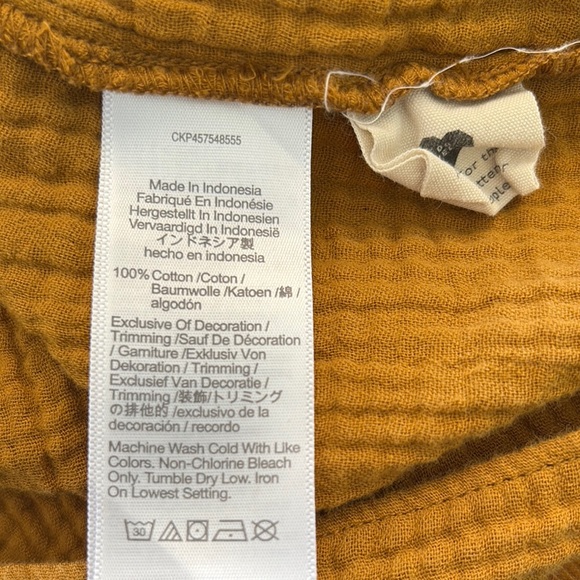 Madewell Double Gauze Smocked Mini Skirt in Mustard. - Picture 5 of 5